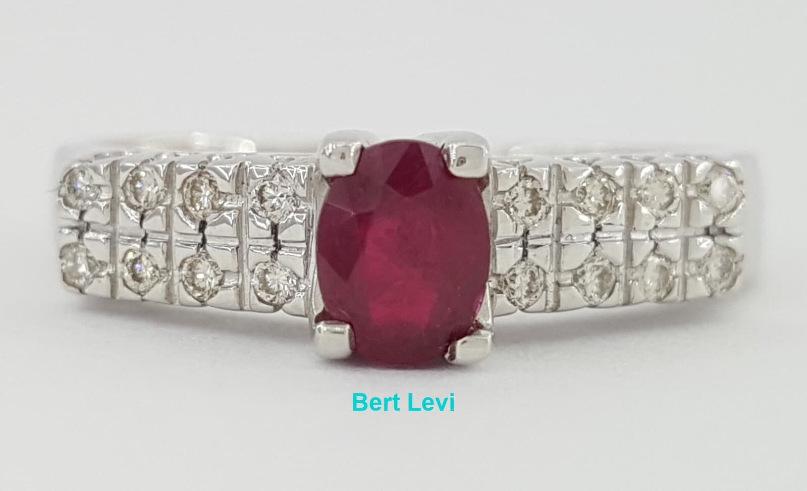 0.57 ct 18k White Gold Oval Cut Ruby & Round Diamond Ring